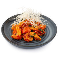 Piquant tiger prawns in tomato-basil sauce with chili